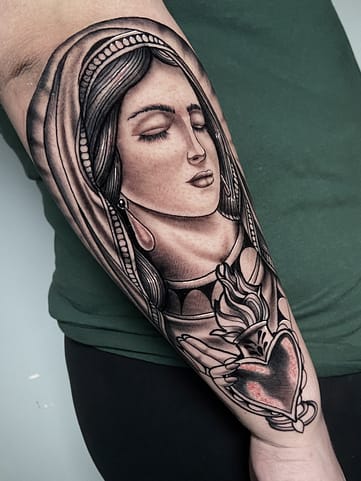 Neo-Traditional Virgin Mary with Sacred Heart - Black and Grey Tattoo in Sacramento Detailed black and grey tattoo of the Virgin Mary holding a Sacred Heart